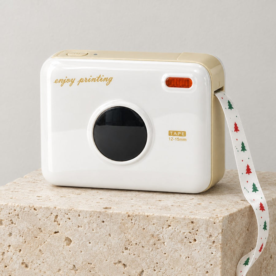 White printer printing a Christmas tree ribbon